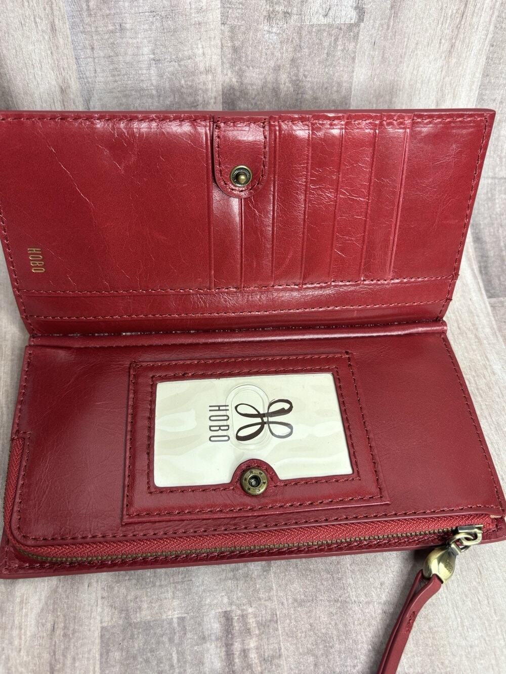 Hobo Women's Continental red leather card, coin holder, zip top, snap closure